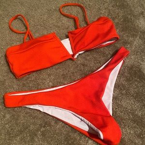 RED SWIM SUIT